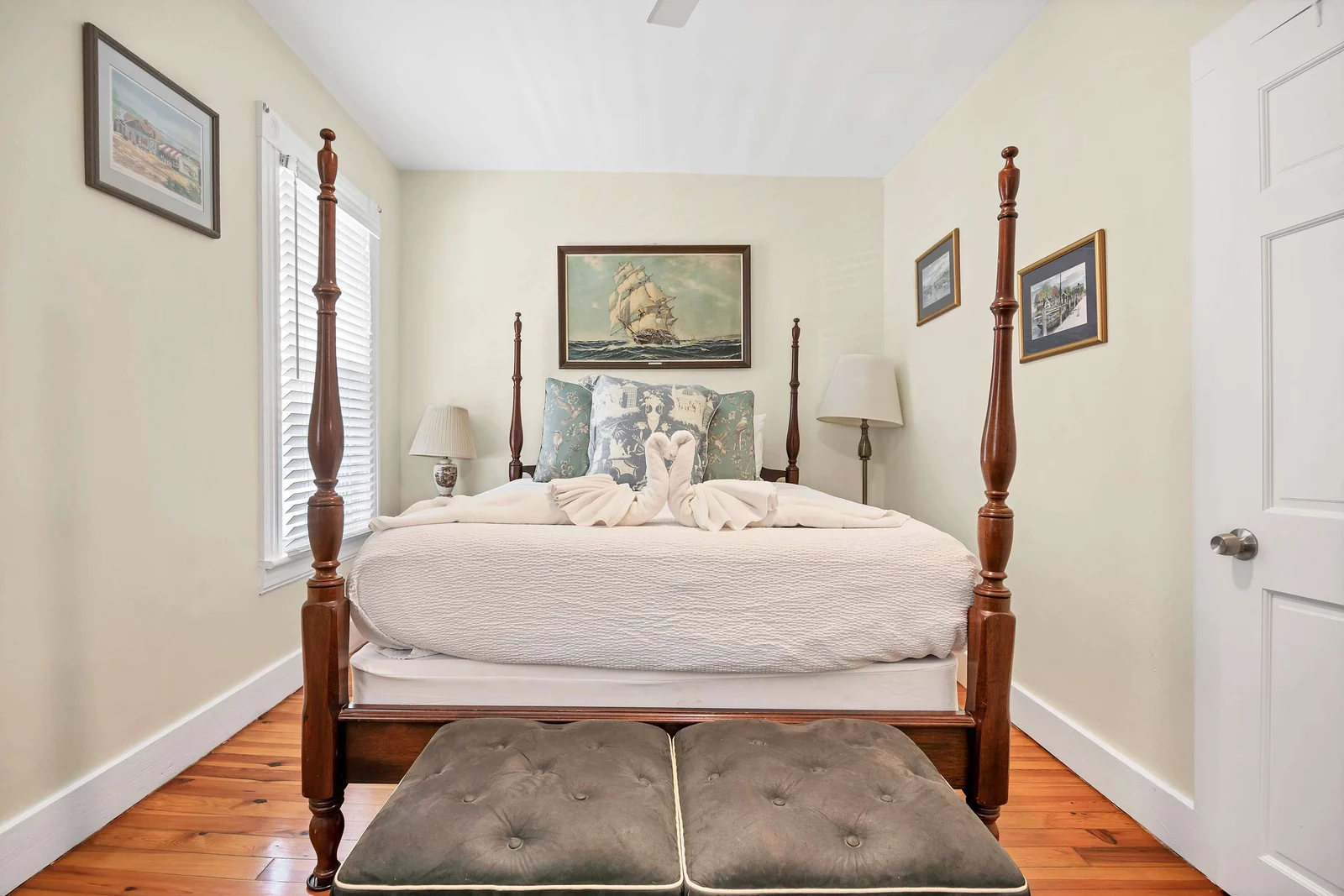 Four-poster primary bedroom